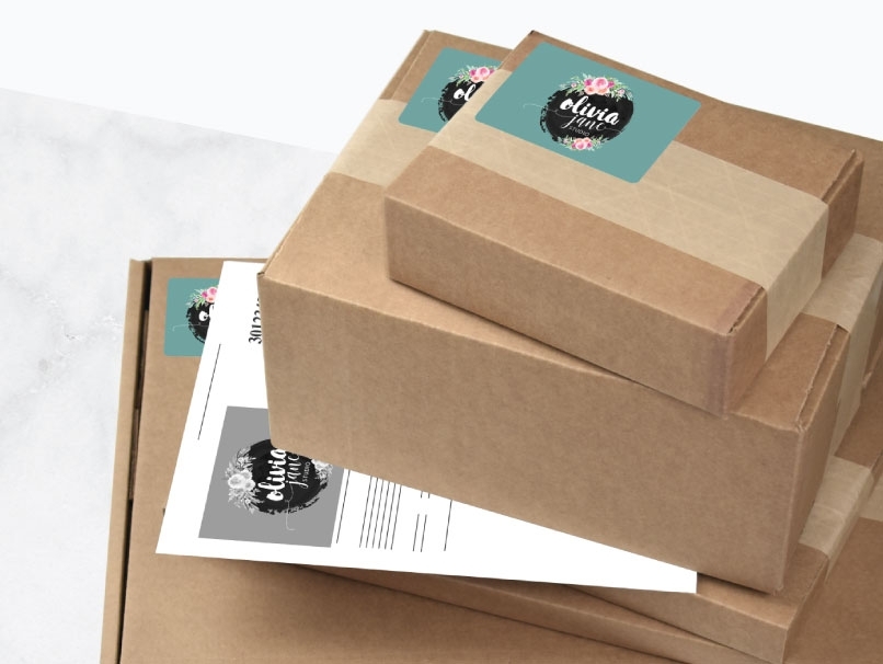 Woman with blonde Hair Opening a Box with Branded Logo Shipping Label