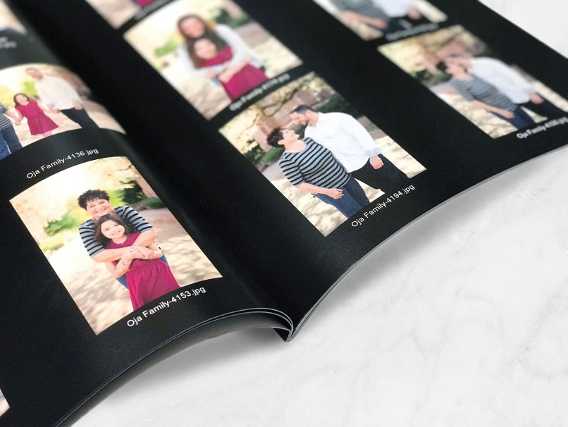 Close up of family session proofs in opened Press Printed Preview Book 